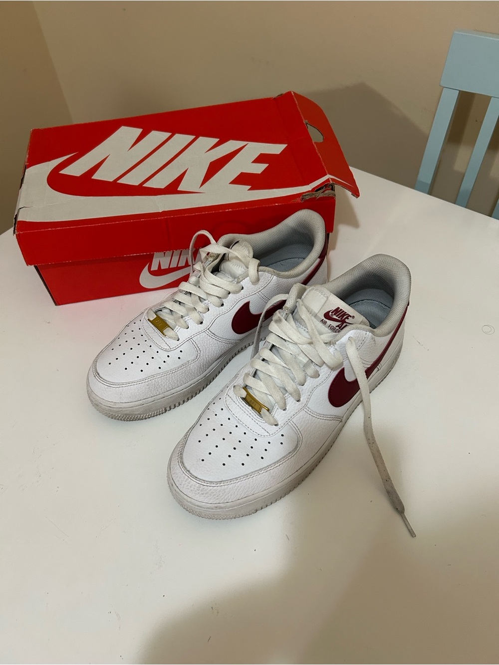 Nike White Low-Top Sneakers with Red Accents